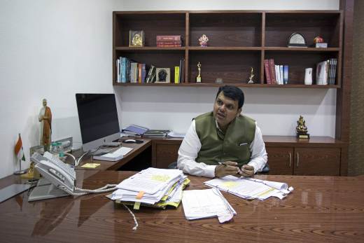 Maharashtra’s chief minister Devendra Fadnavis speaks to his staff at his official residence in Mumbai. | (File Photo/Reuters)